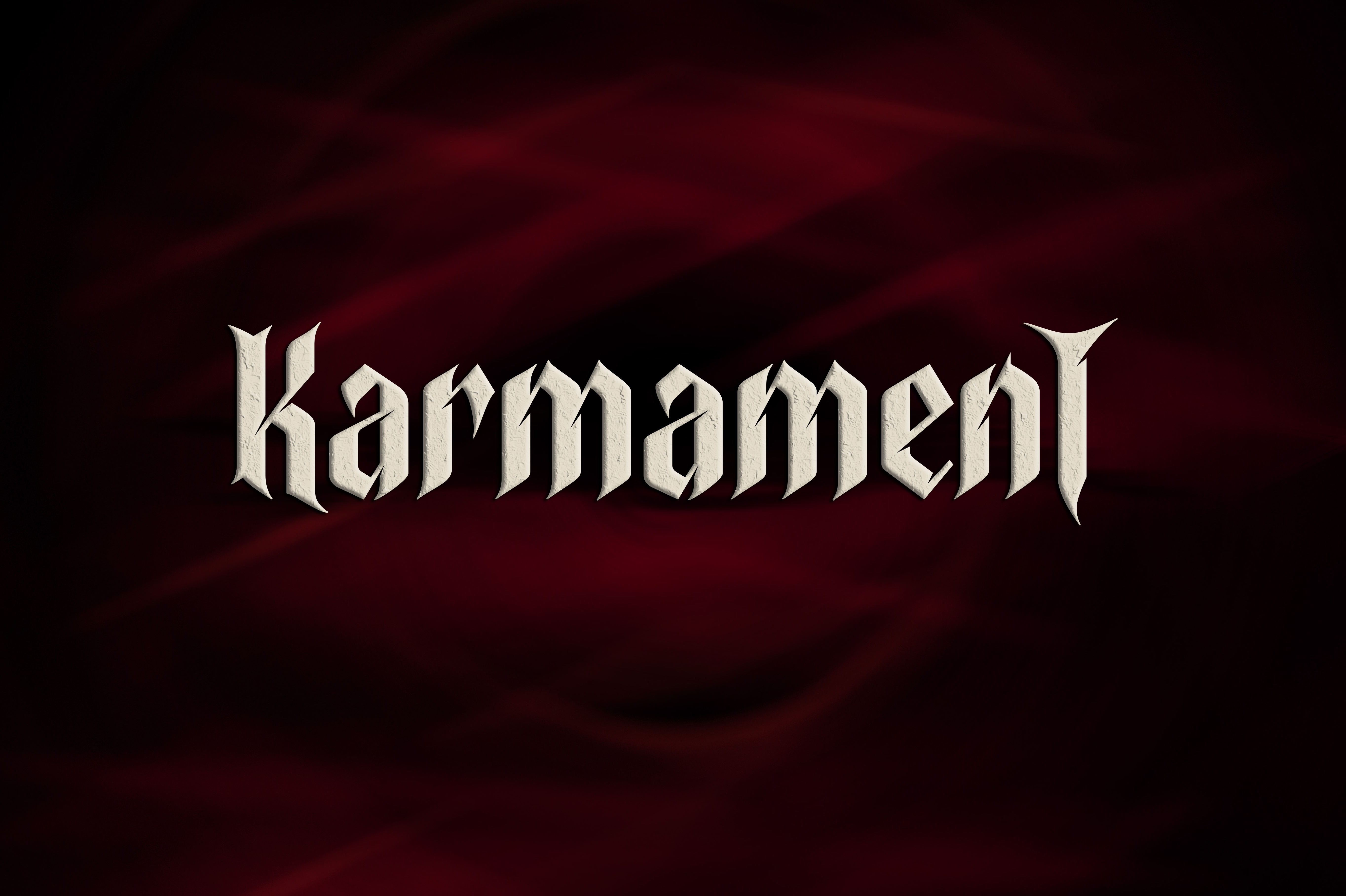 White Karmament Logo in front of a black and red background